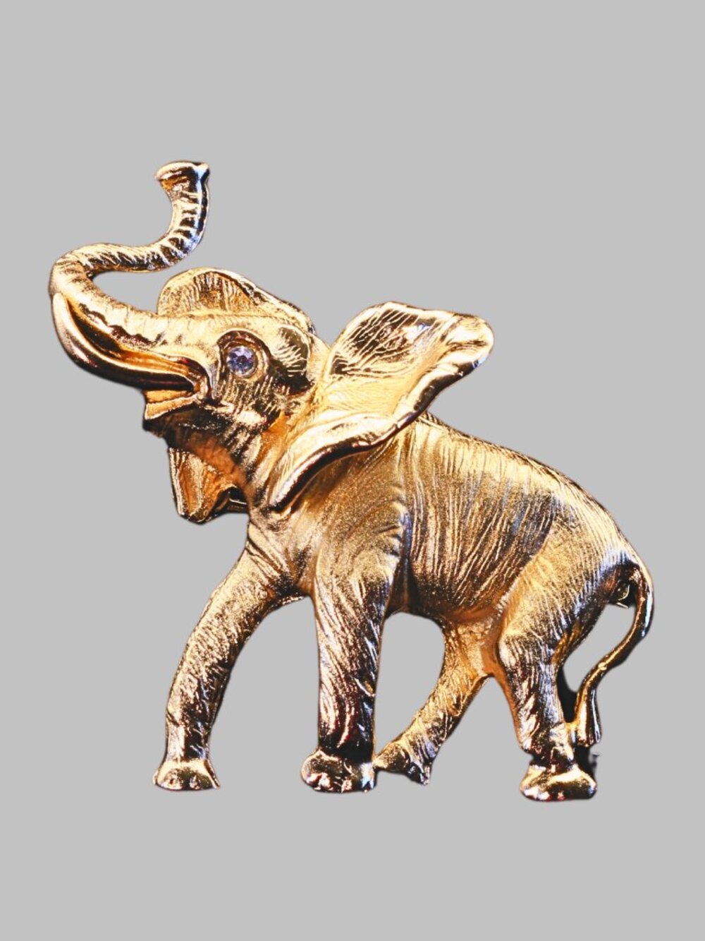 VTG NAPIER Trumpeting African Elephant Brooch Pin Goldtone Rhinestone Eye Signed